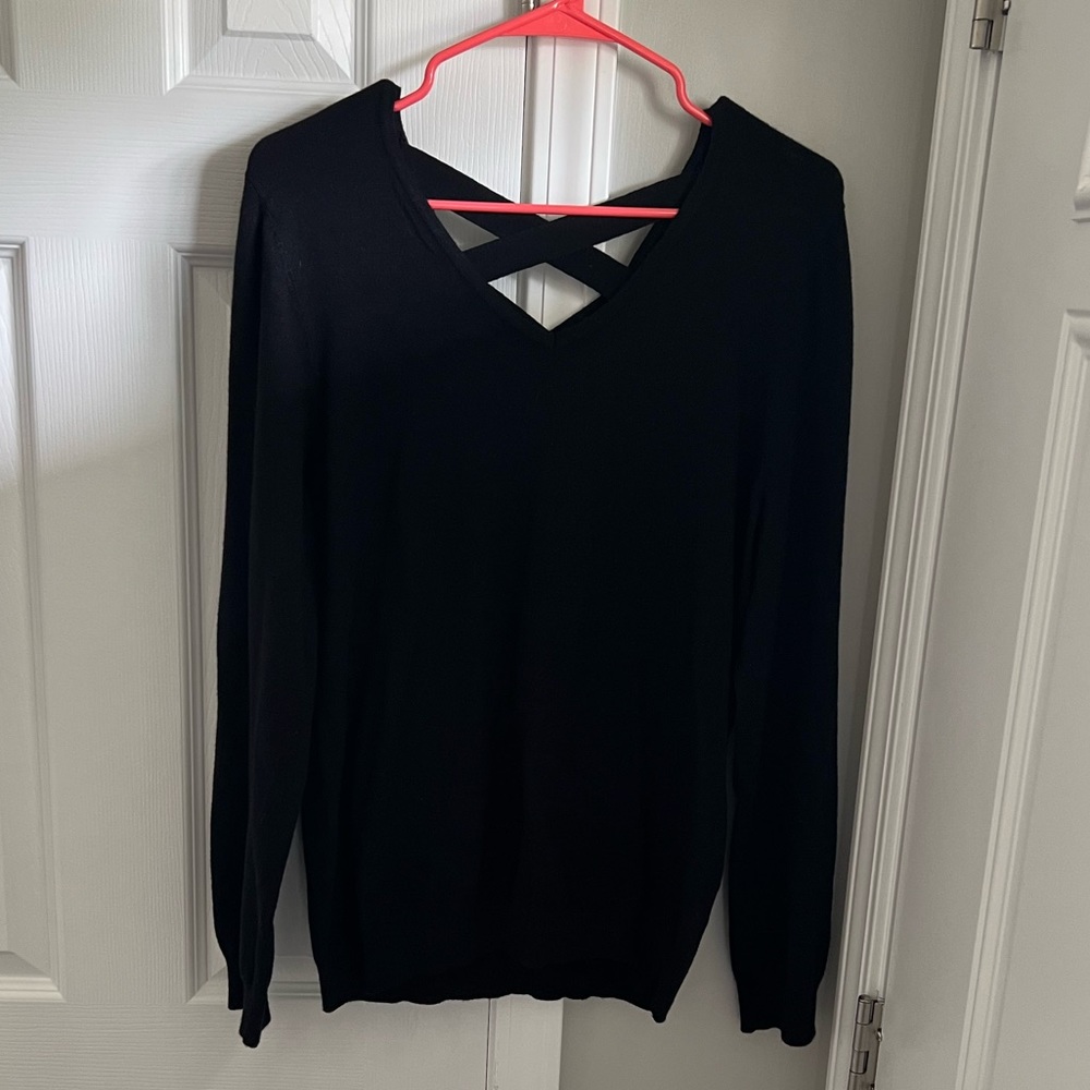 Black long sleeve sweater with Criss Cross open Top Back. Size Large.